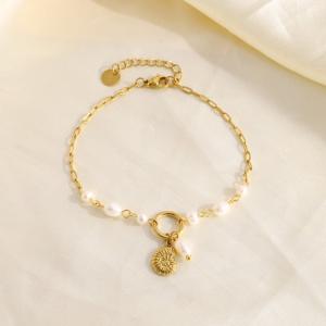 Bracelet doré pendentif nautile - image 2